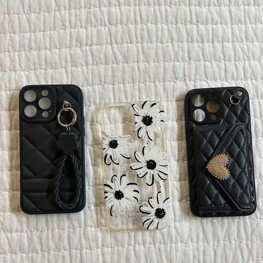 Kate Spade Clear Case with Black Floral Design 14 pro max  & 2 others